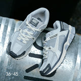 Nike Air Zoom Vomero 5 Sneakers in Light Gray and Navy