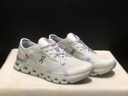 On Cloud X 4 AD Sneakers in Wolf/Alloy Light Gray